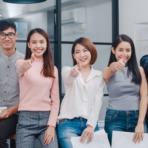 group-asia-young-creative-people-smart-casual-wear-smiling-thumbs-up-creative-office-workplace